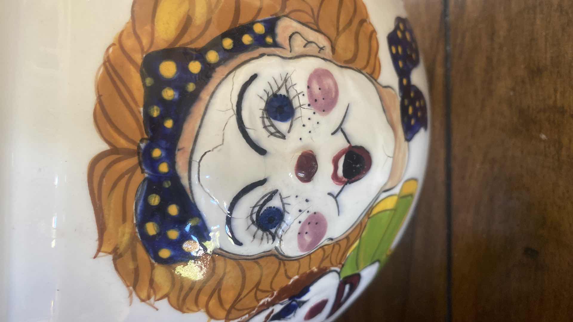 Photo 1 of HAND PAINTED CERAMIC POT WITH CLOWNS 8 1/2” x 7”