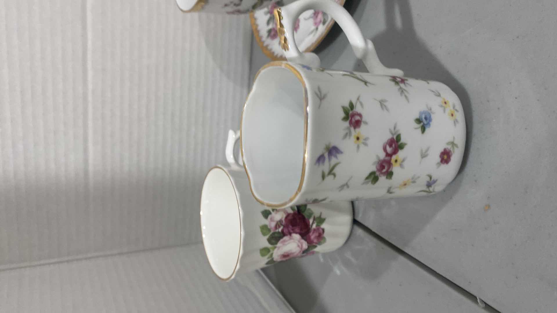 Photo 1 of 2 TEACUPS & SAUCERS & 4 TEACUPS