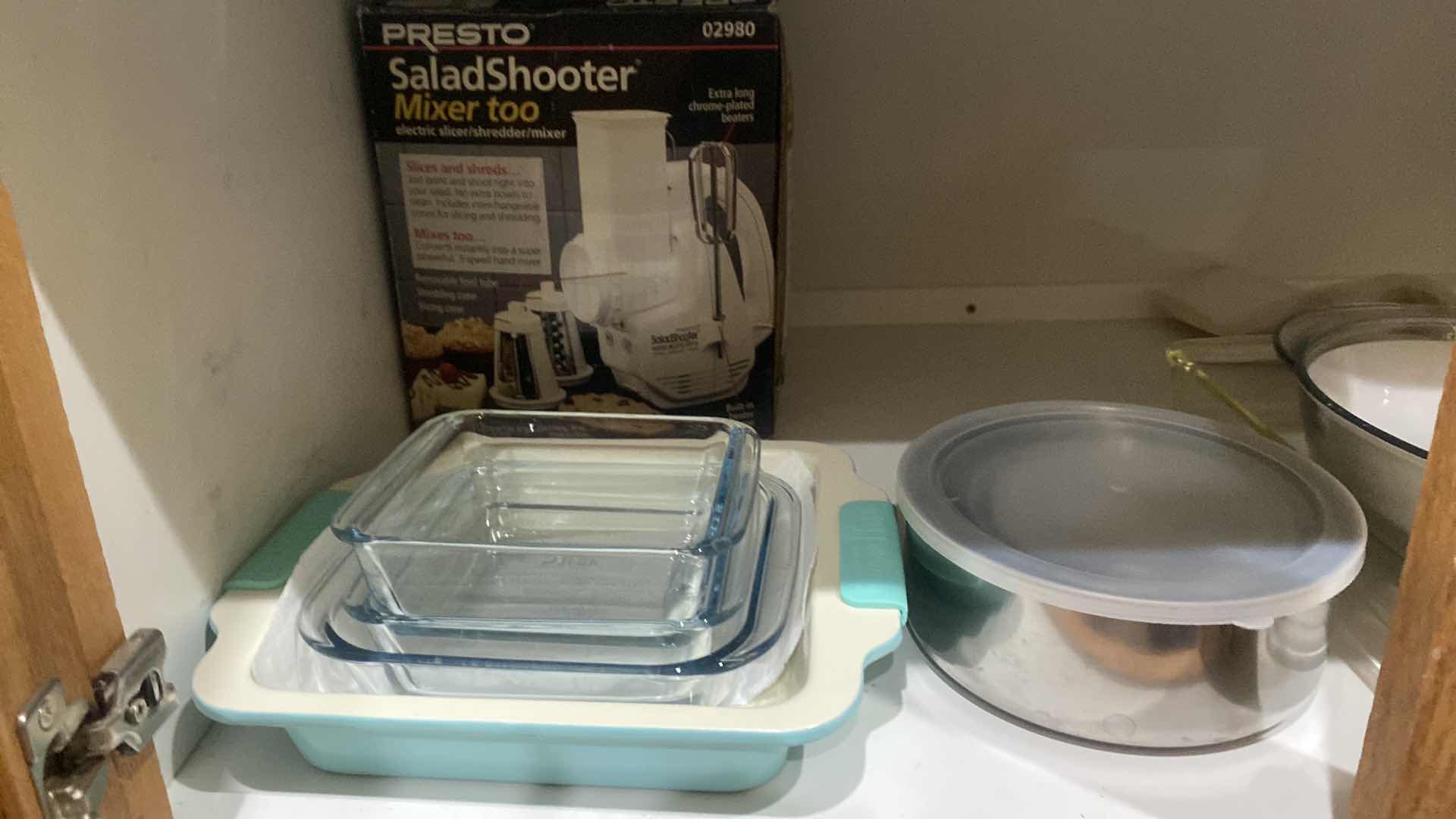 Photo 1 of CONTENTS OF CABINET - GLASS BAKEWARE & PLASTIC COLANDERS & MORE