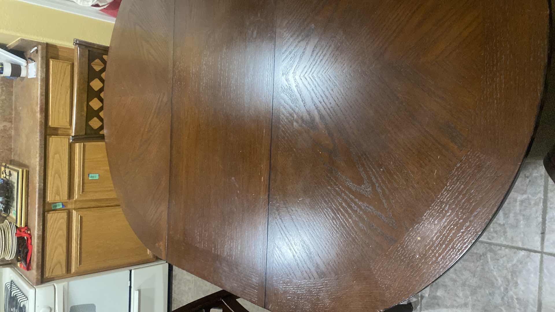 Photo 1 of WOOD COUNTER HEIGHT TABLE WITH STORAGE,18” LEAF & 4 CHAIRS - MEASURES 42” x 42” H36” WITHOUT LEAF (some scratches and stains)