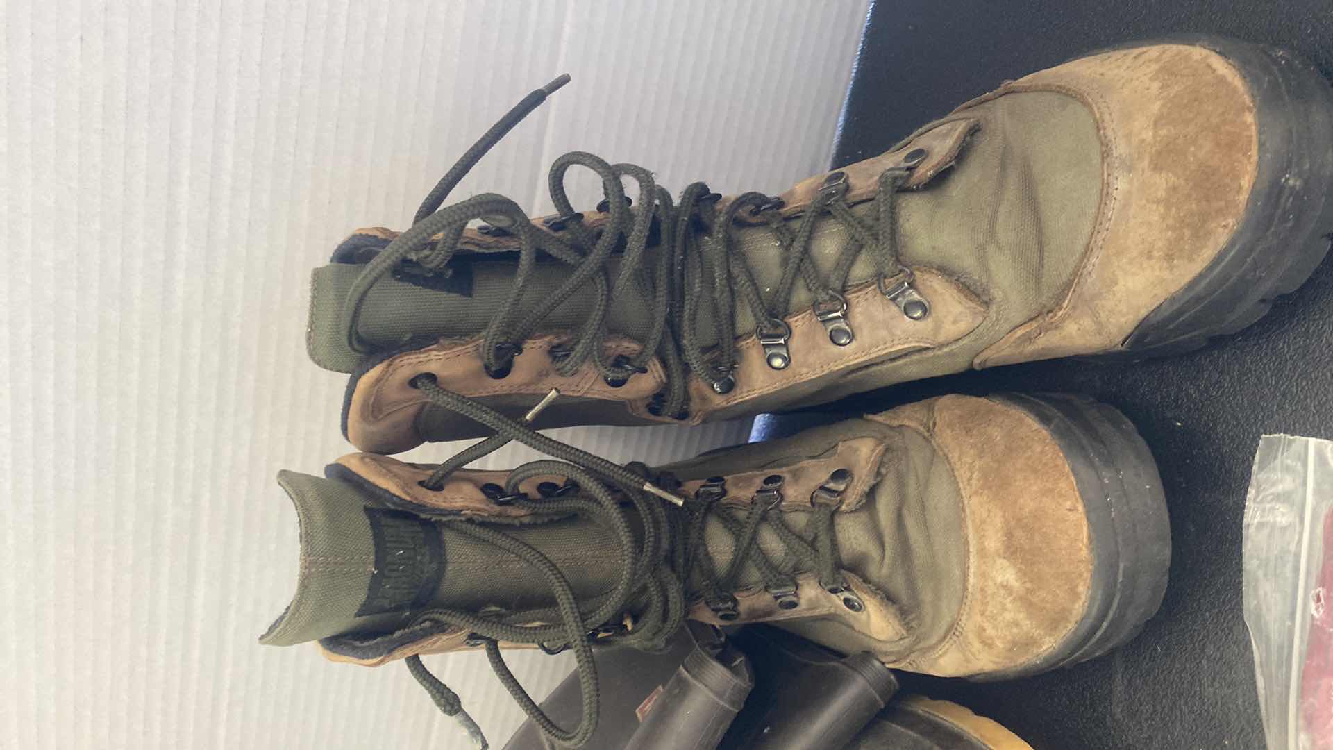 Photo 1 of RUBBER BOOTS SUZE 9, HIKING BOOTS SIZE 10, FISHING REEL, BIOT LACES & PONCHO