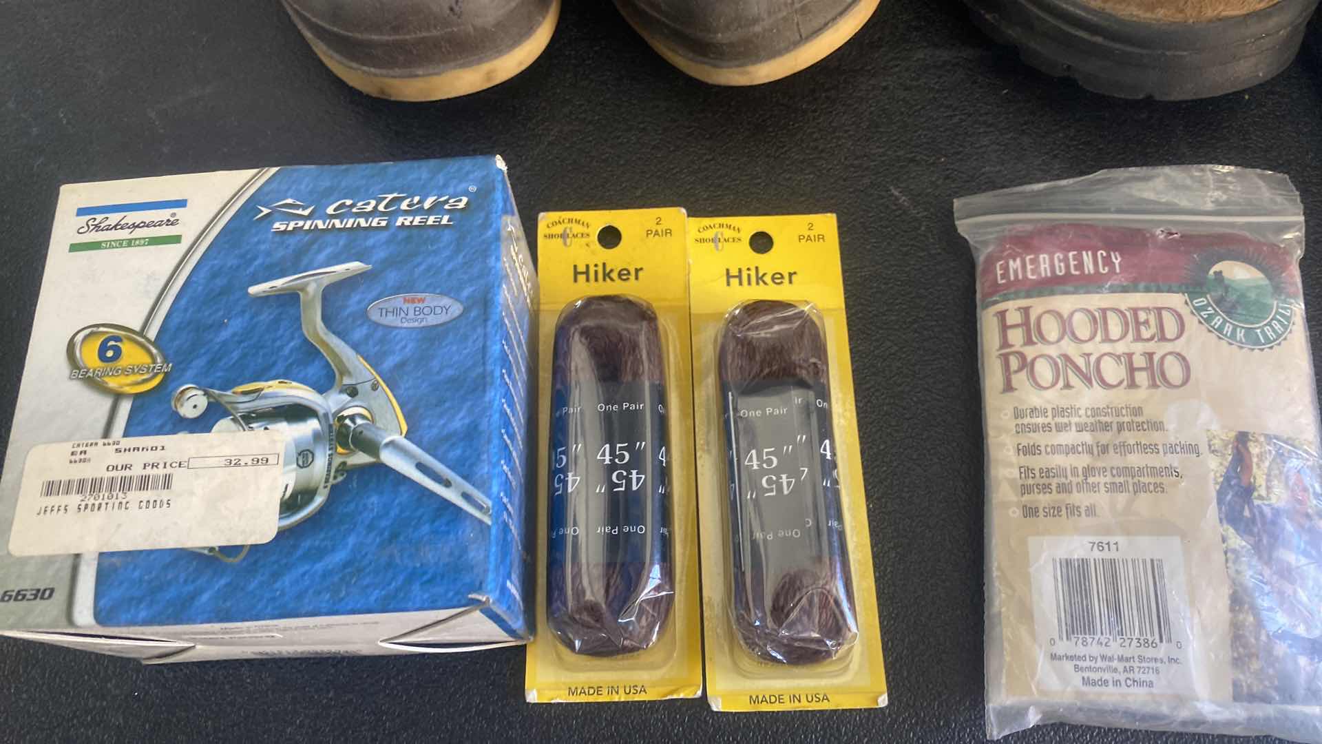 Photo 1 of RUBBER BOOTS SUZE 9, HIKING BOOTS SIZE 10, FISHING REEL, BIOT LACES & PONCHO