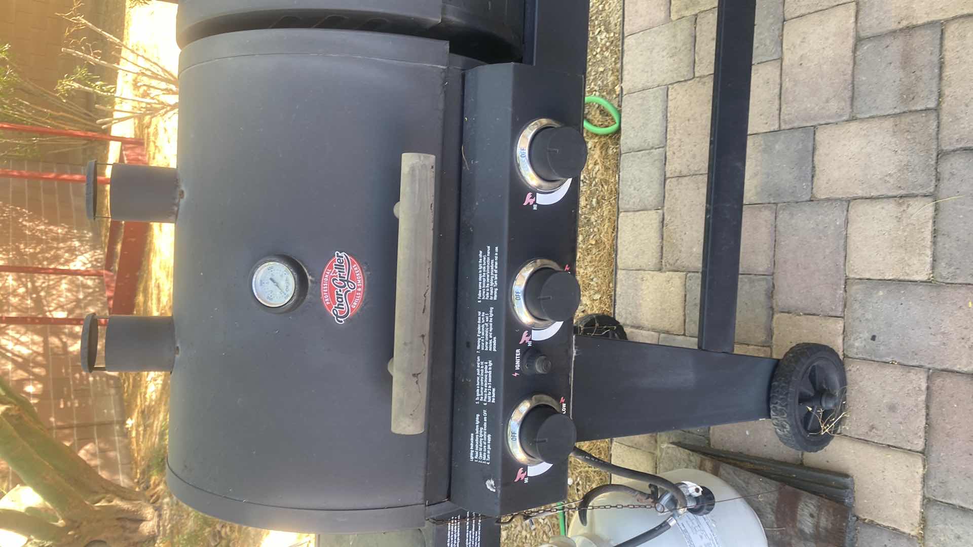 Photo 1 of PROFESSIONAL CHAR-GRILLER WITH PROPANE TANK 66“ x 25“ H53”