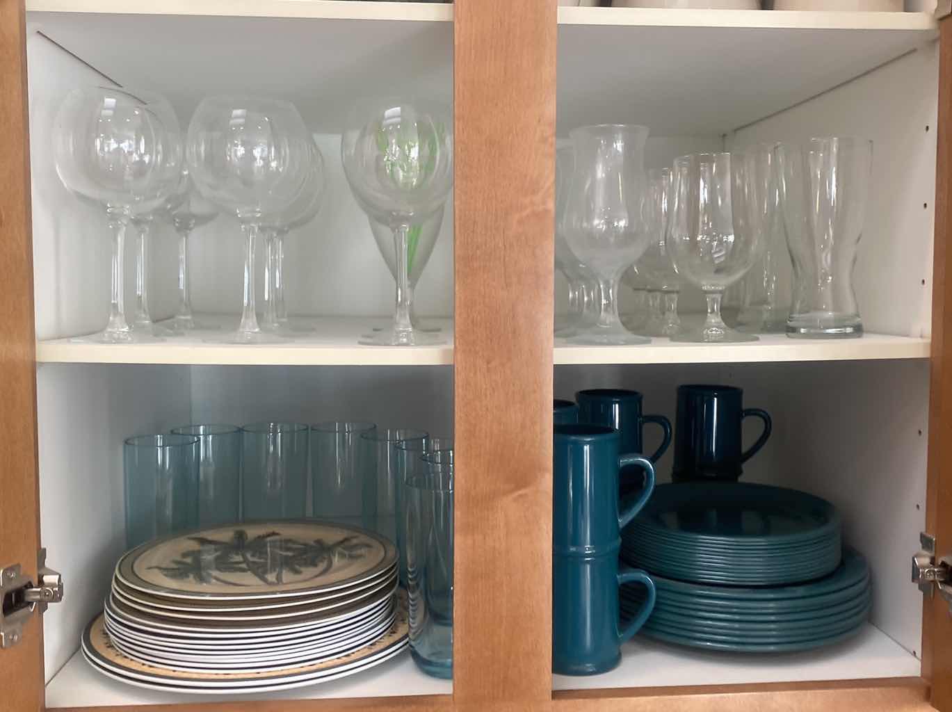Photo 1 of CONTENTS OF CABINET - 1 SHELF MELAMINE DISHES, COFFEE CUPS, GLASSES & PITCHER, 1 SHELF STEMWARE