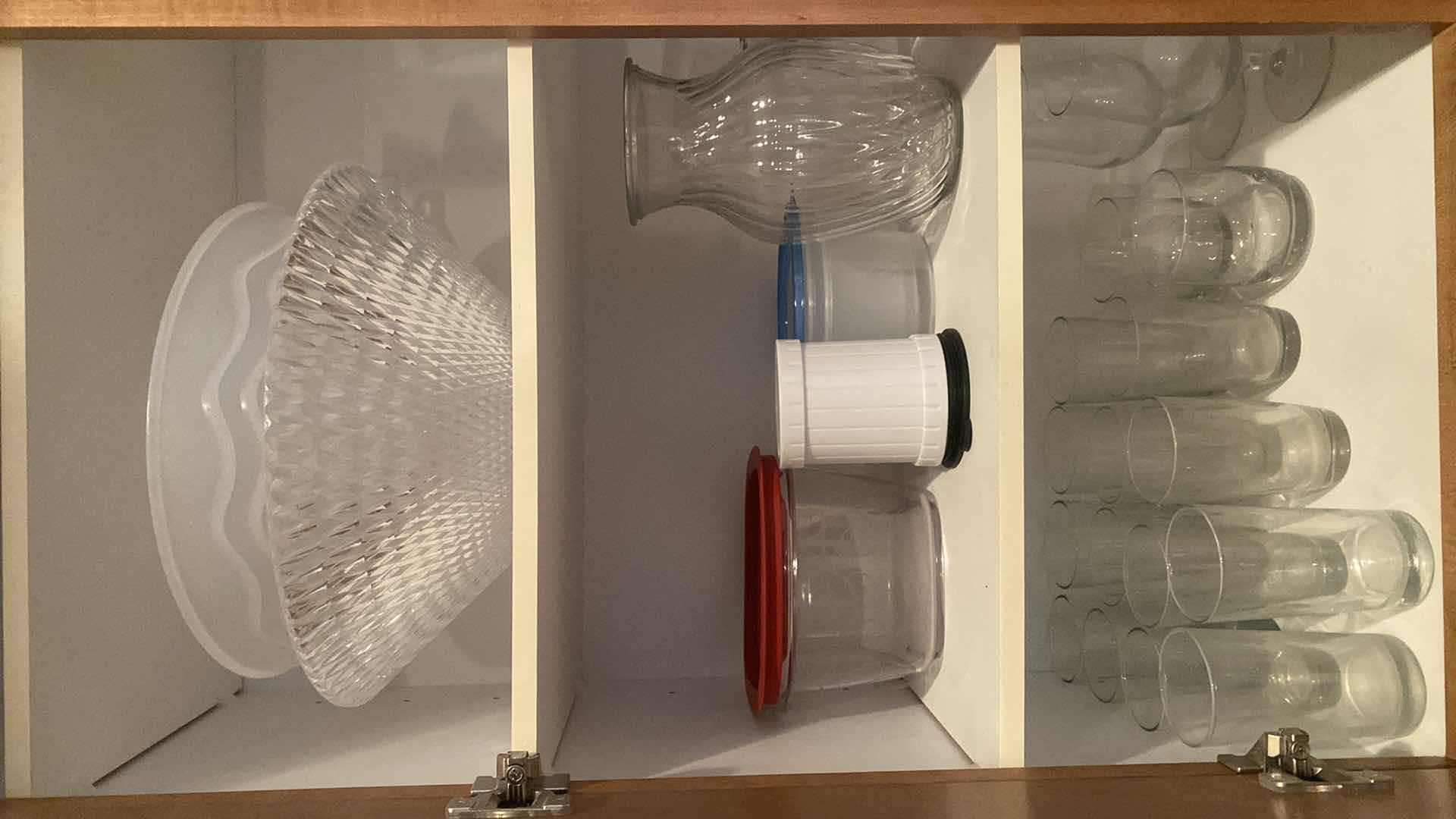 Photo 1 of CONTENTS OF CABINET - PLASTIC BOWLS, GLASS VASES, GLASSES, GLASS SUNDAE DISHES & SALAD BOWLS