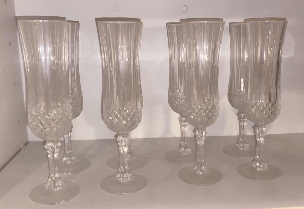 Photo 1 of CONTENTS OF CABINET - 1 SHELF LONGCHAMPS 8 CHAMPAGNE GLASSES