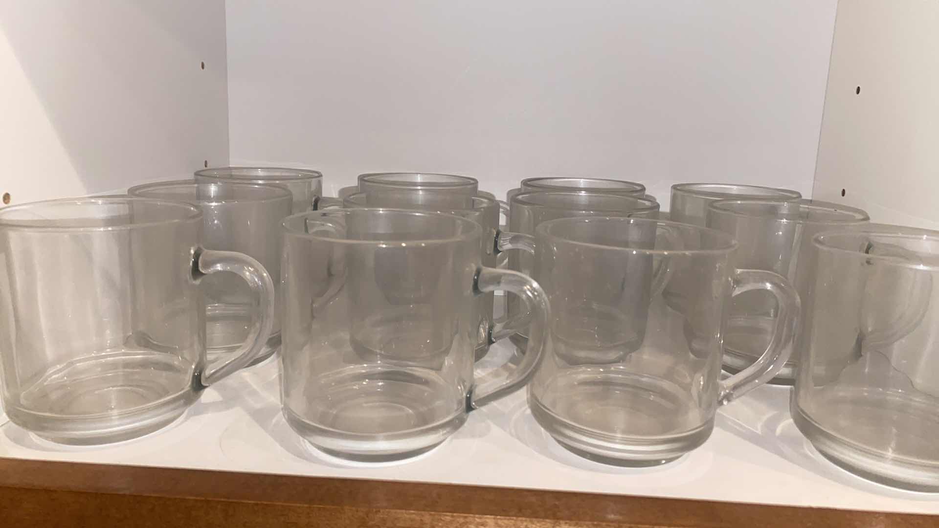 Photo 1 of CONTENTS OF CABINET - 18 GLASS COFFEE CUPS & 5 GLASS MUGS