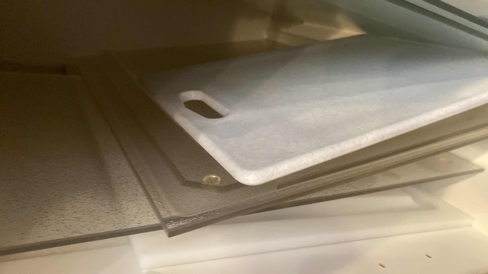 Photo 1 of CONTENTS OF CABINET - 8 CUTTING BOARDS