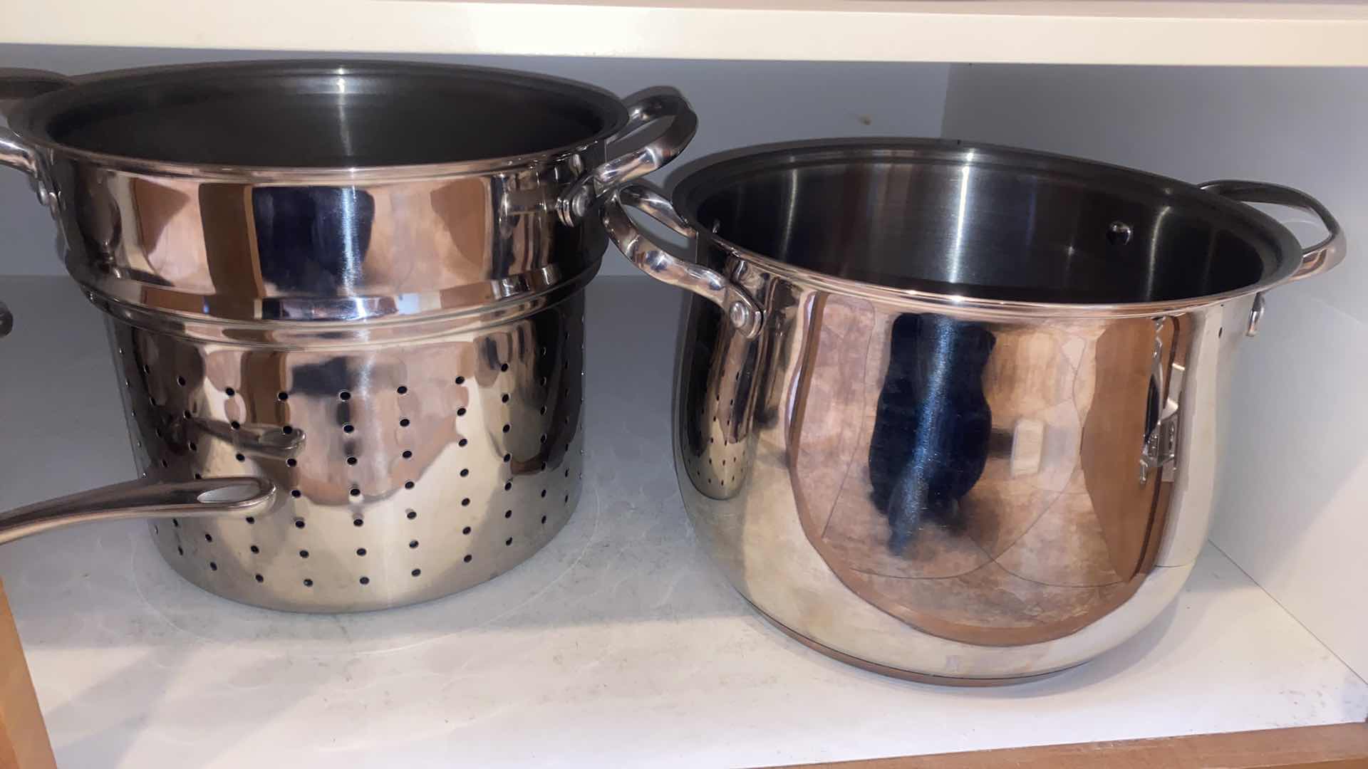 Photo 1 of CONTENTS OF CABINET - POTS & PANS