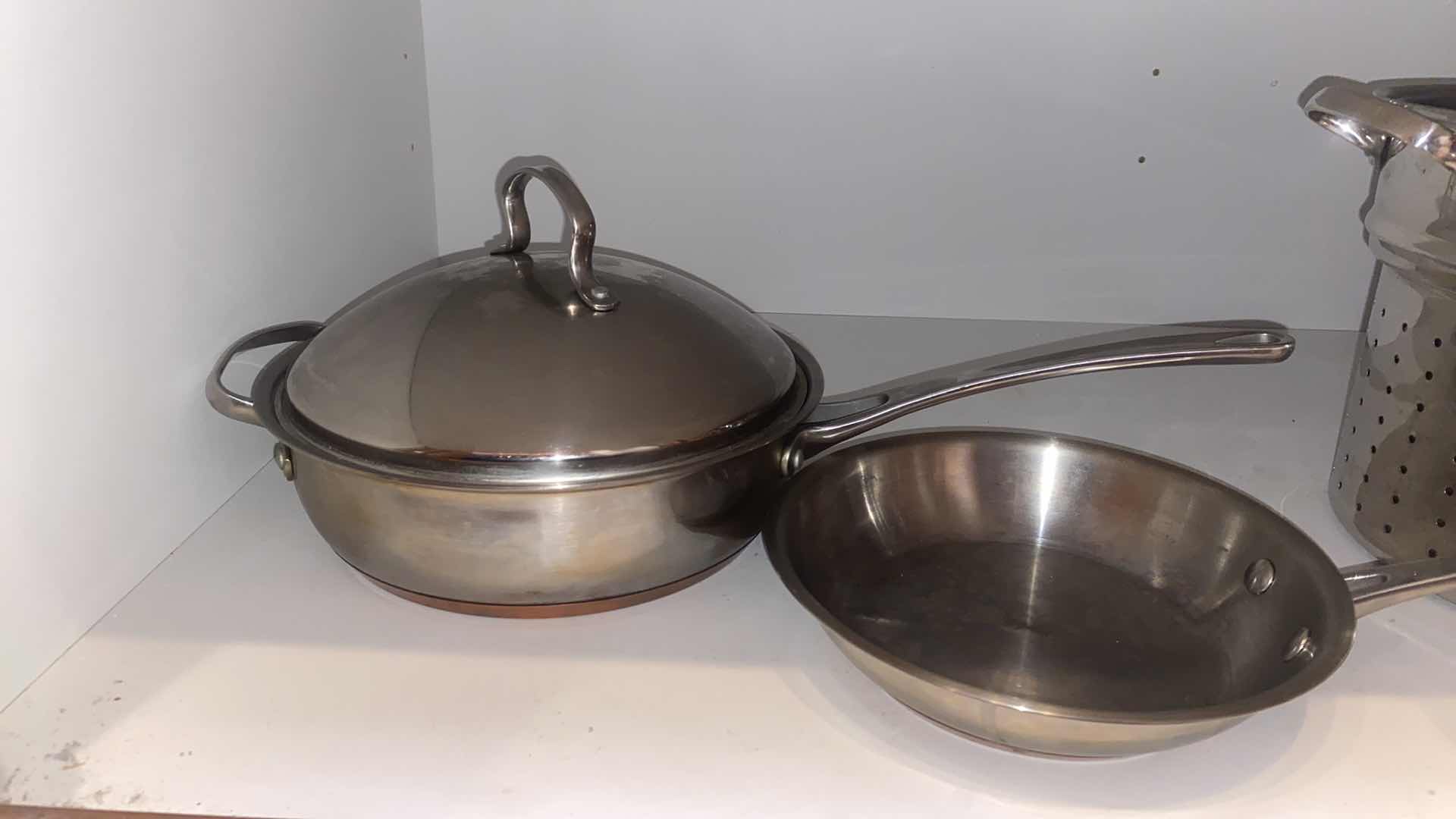 Photo 1 of CONTENTS OF CABINET - POTS & PANS