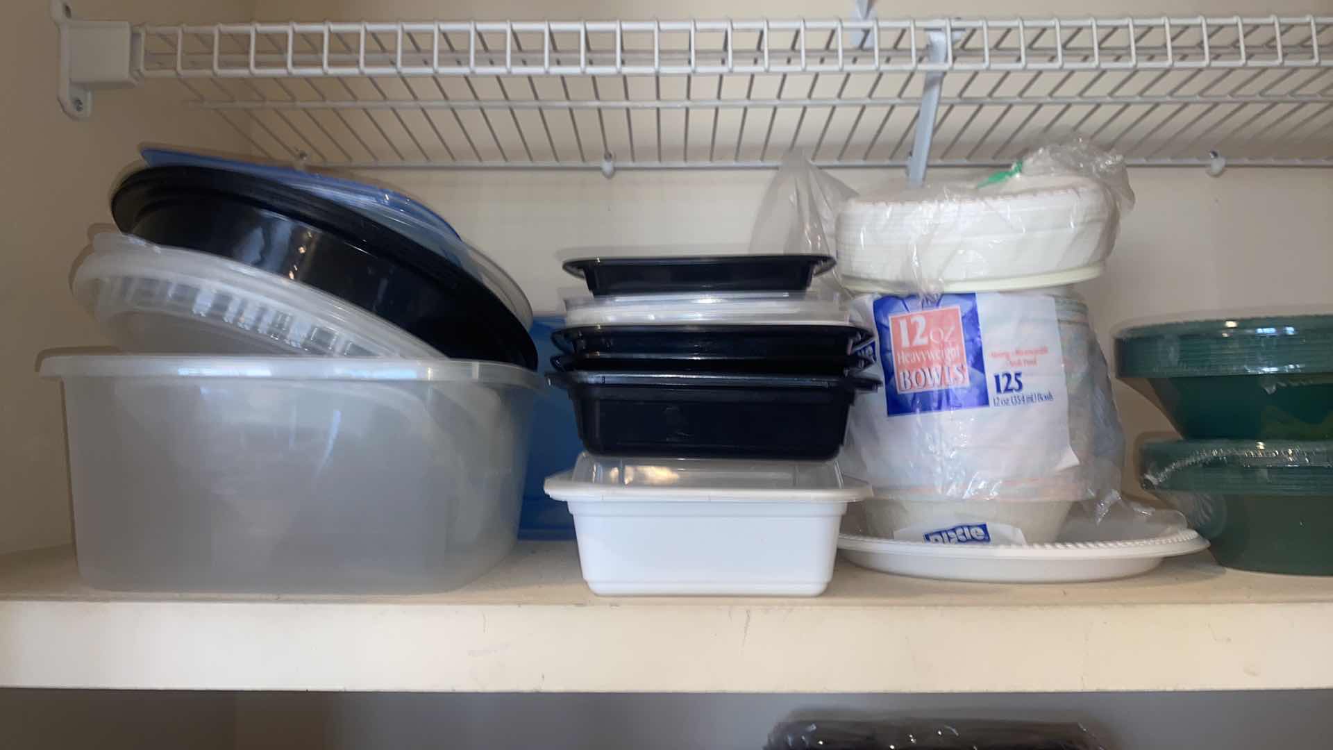 Photo 1 of CONTENTS OF CLOSET - KITCHEN PAPER BOWLS, PLASTIC STORAGE, NAPKINS TABLECLOTHS & METAL FRUIT BOWL & NAPKIN HOLDERS