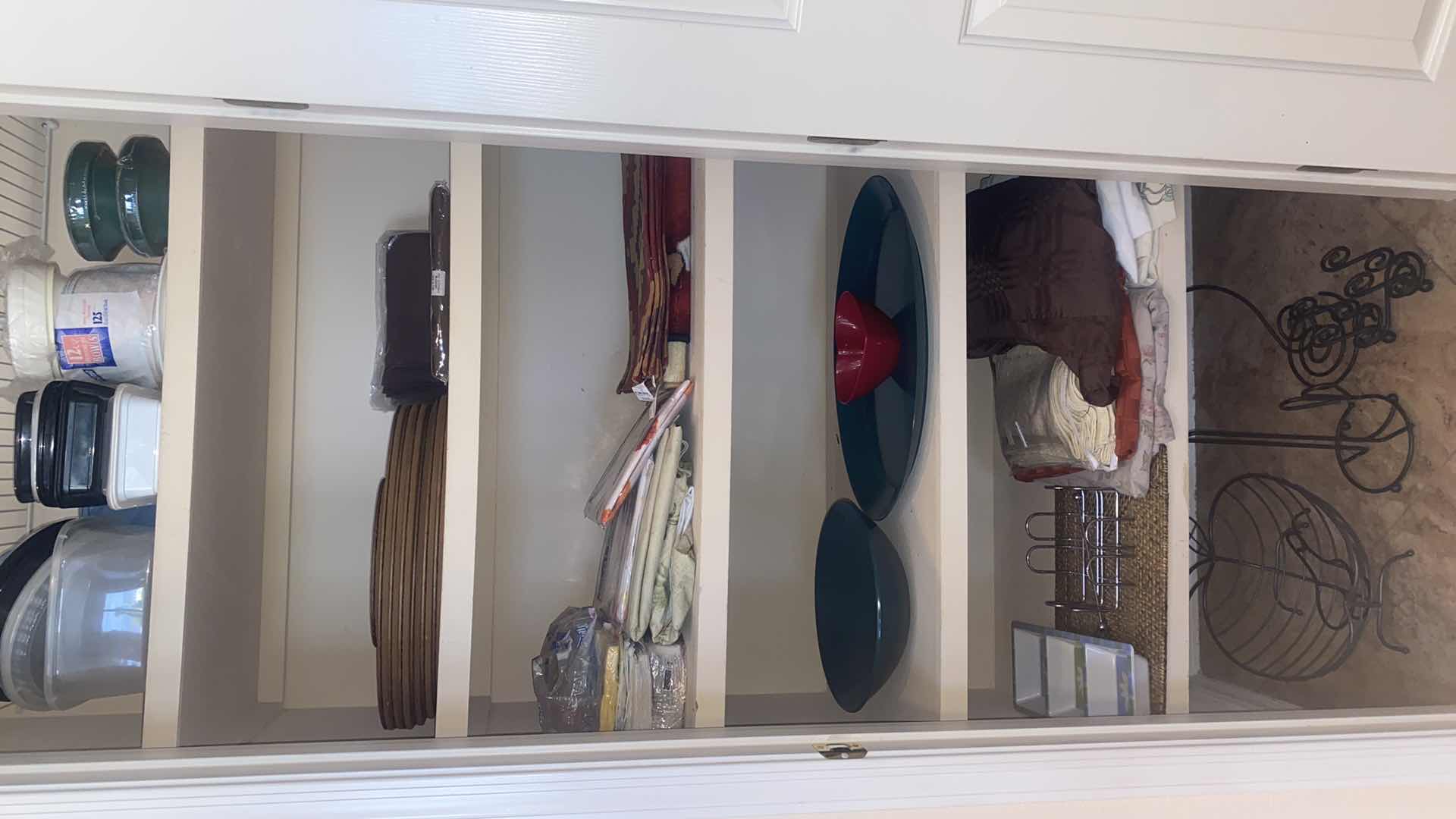 Photo 1 of CONTENTS OF CLOSET - KITCHEN PAPER BOWLS, PLASTIC STORAGE, NAPKINS TABLECLOTHS & METAL FRUIT BOWL & NAPKIN HOLDERS