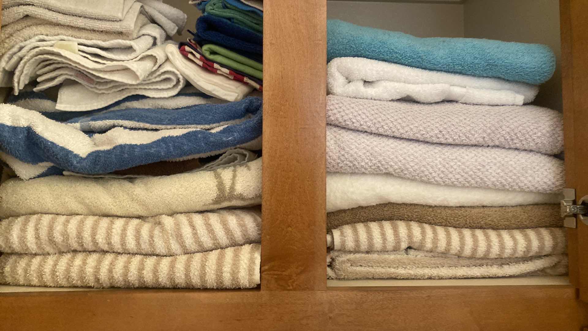 Photo 1 of CONTENTS OF CABINETS - BATH TOWELS & KLEENEX CLEANERS & HEALTH AIDS