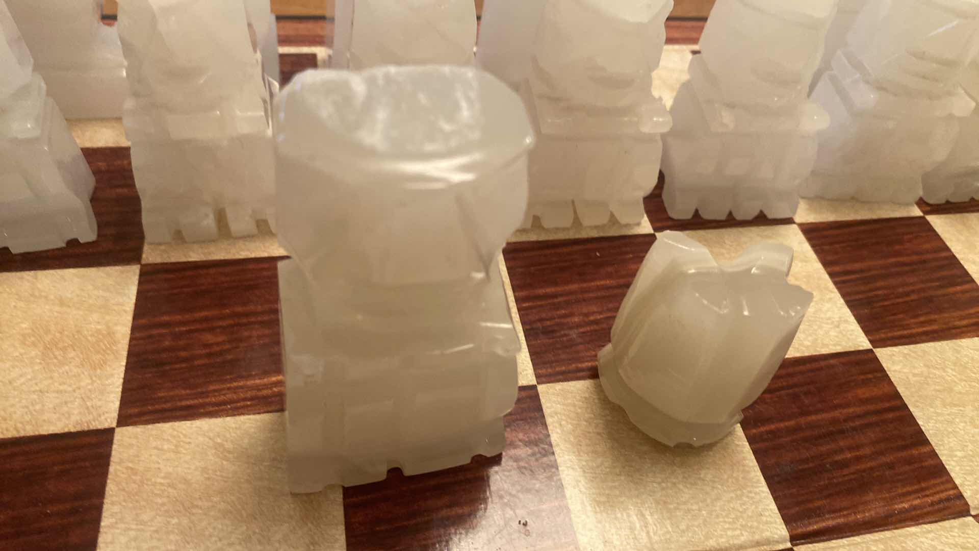 Photo 1 of CARVED ONYX CHESS SET (HEAD OF WHITE QUEEN NEEDS REPAIRED) ESR VALUE $125