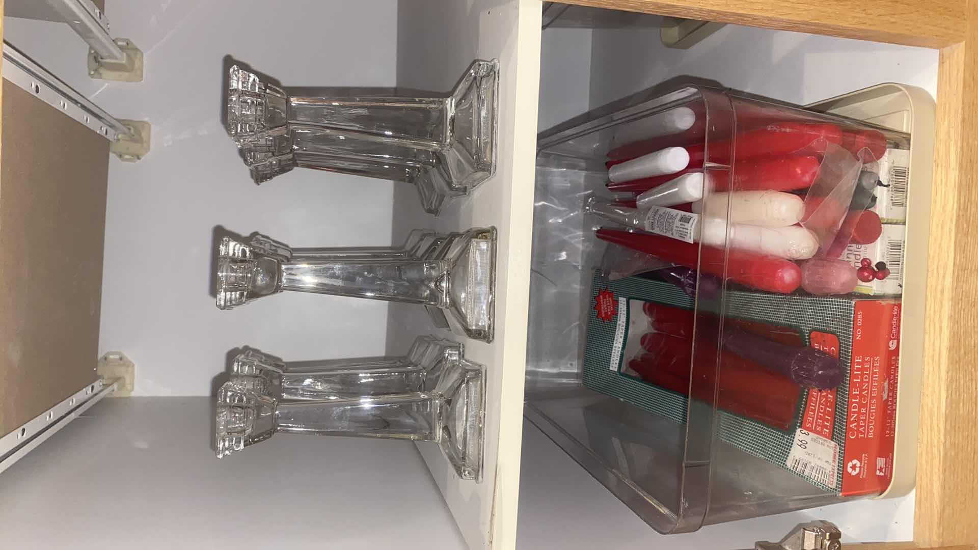 Photo 1 of CONTENTS OF CABINET-CANDLES & 10 CANDLE HOLDERS