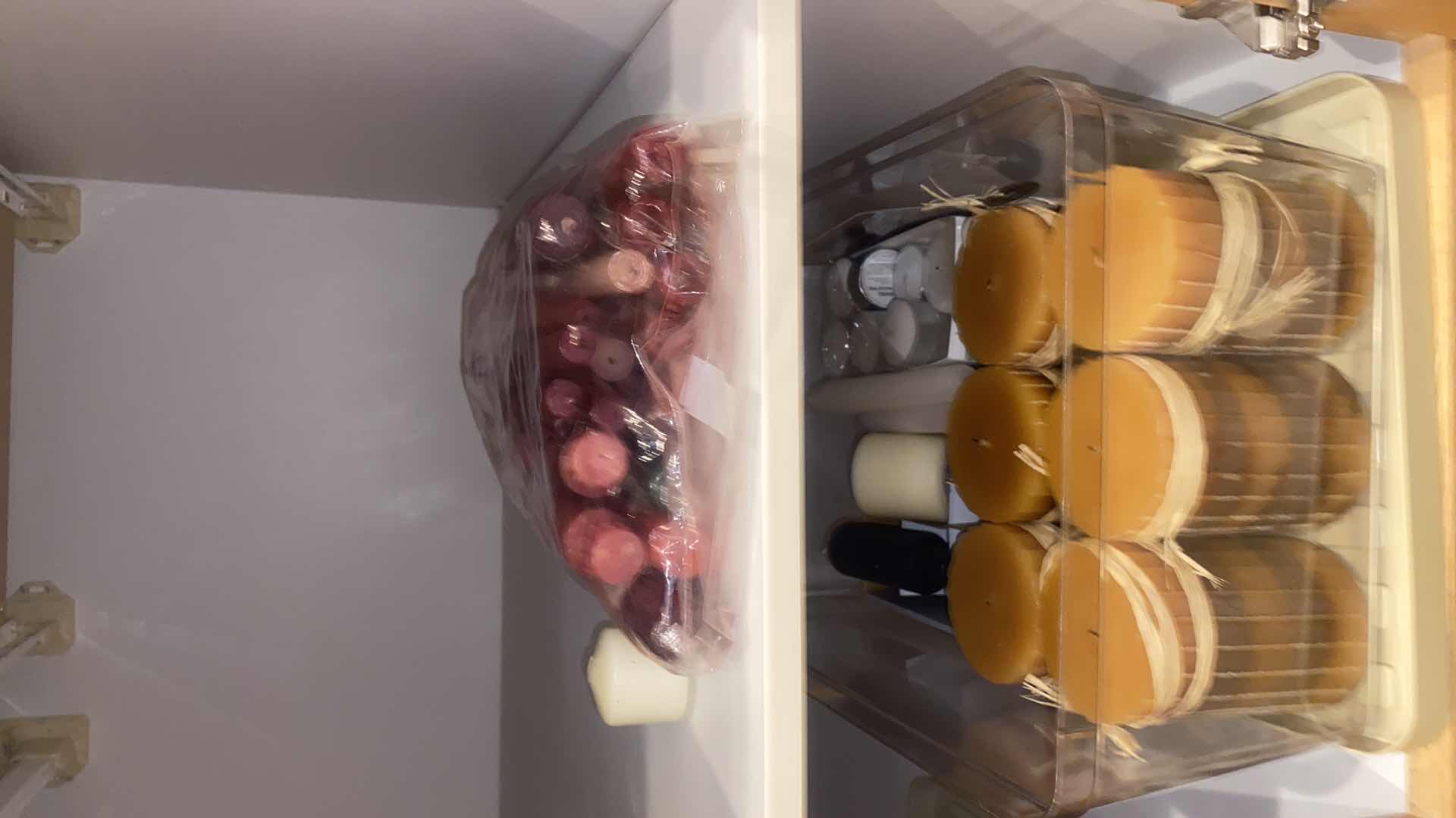 Photo 1 of CONTENTS OF CABINET-CANDLES & 10 CANDLE HOLDERS