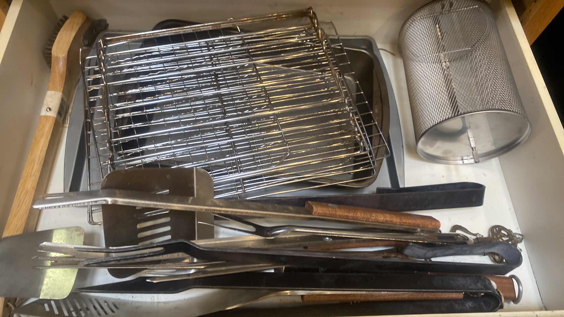 Photo 1 of CONTENTS OF CABINET BBQ TOOLS