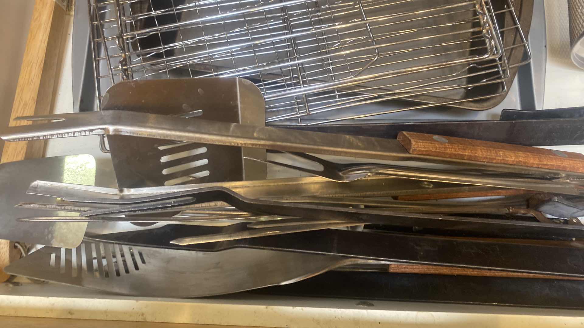 Photo 1 of CONTENTS OF CABINET BBQ TOOLS