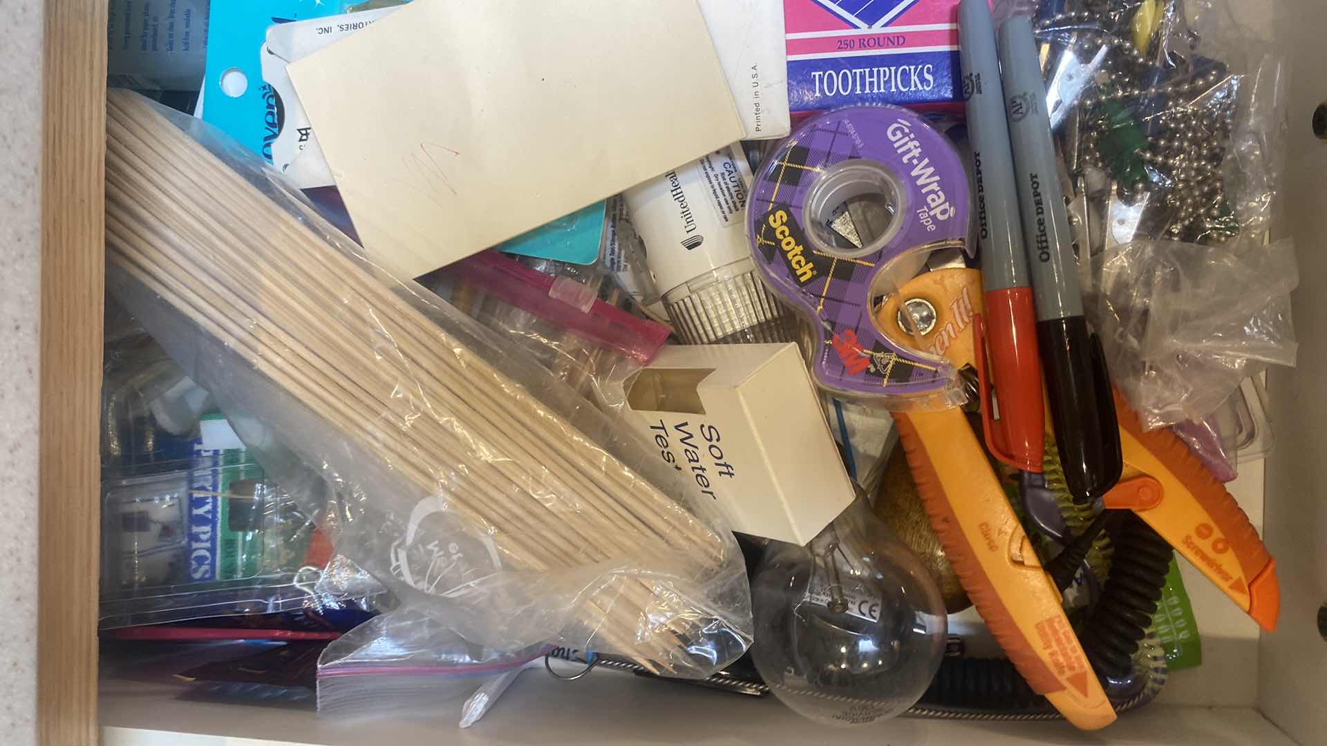 Photo 1 of CONTENTS OF CABINET-2 DRAWERS JUNK & NAPKIN RINGS