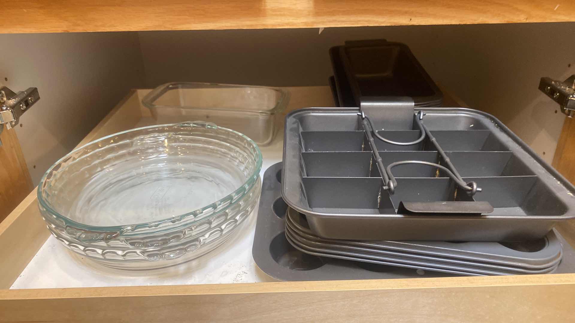 Photo 1 of CONTENTS OF CABINET-BAKEWARE GLASS & METAL
