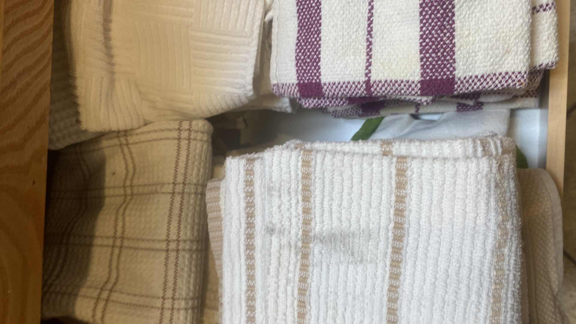 Photo 1 of CONTENTS OF CABINET-DISH TOWELS & POT HOLDERS