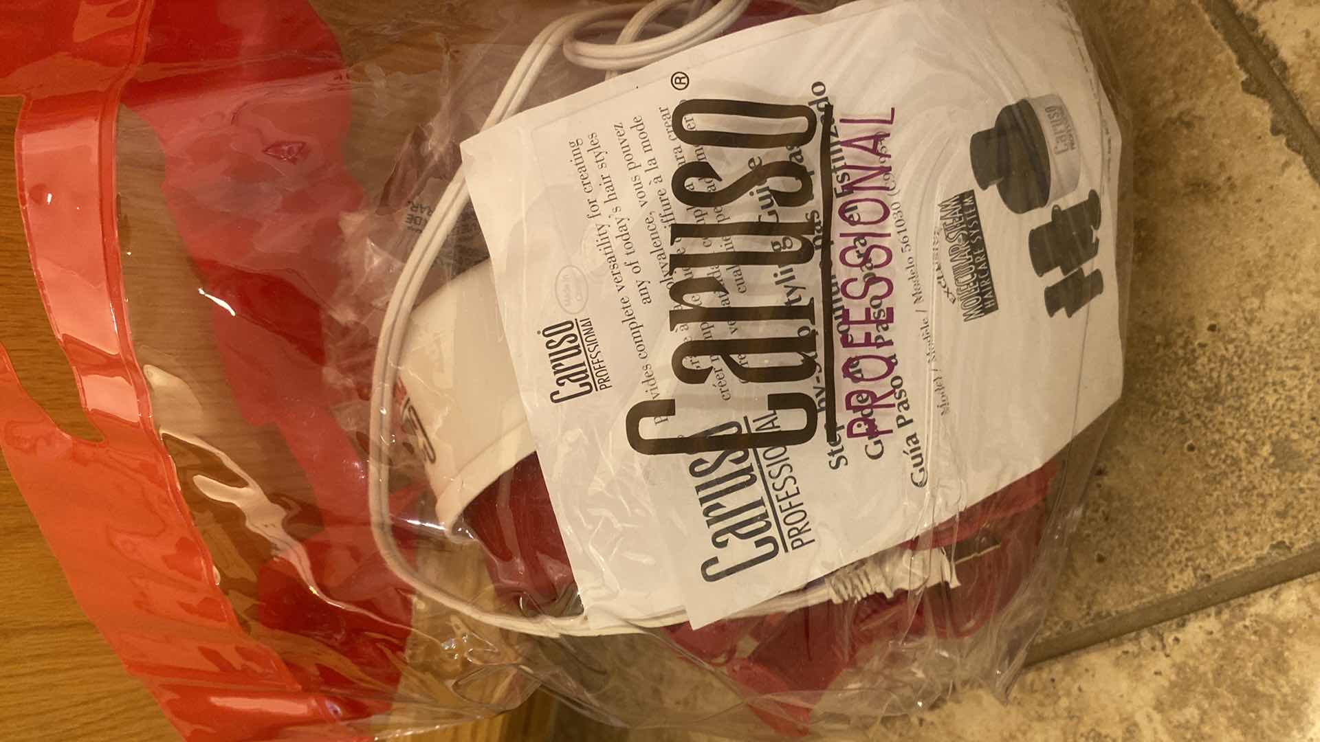 Photo 1 of CONTENTS OF CABINET - NEW SELF CARE PRODUCTS & CARUSO PROFESSIONAL CURLERS