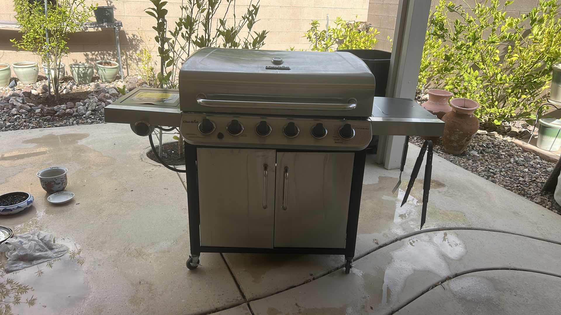 Photo 1 of CHAR-BROIL PERFORMANCE SERIES STAINLESS STEEL 6-BURNER LIQUID PROPANE GAS GRILL WITH 1 LIDDED SIDE BURNER. $500