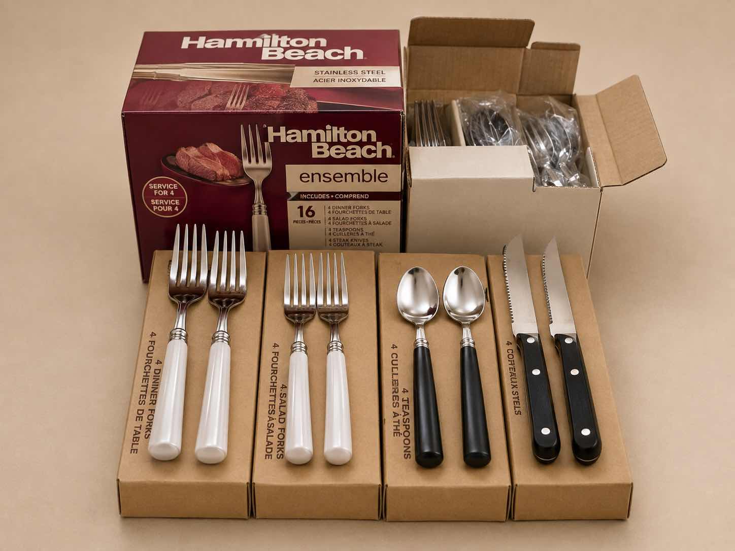 Photo 1 of HAMILTON BEACH TOASTER FOR AND RESORT GLASSES AND FIVE BOXES OF NEW LARGE FORK UTENSILS