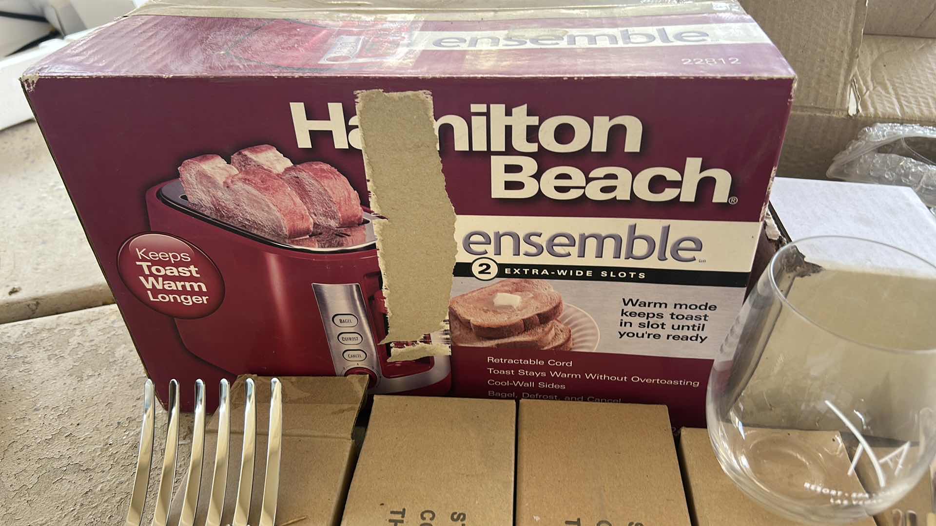 Photo 1 of HAMILTON BEACH TOASTER FOR AND RESORT GLASSES AND FIVE BOXES OF NEW LARGE FORK UTENSILS