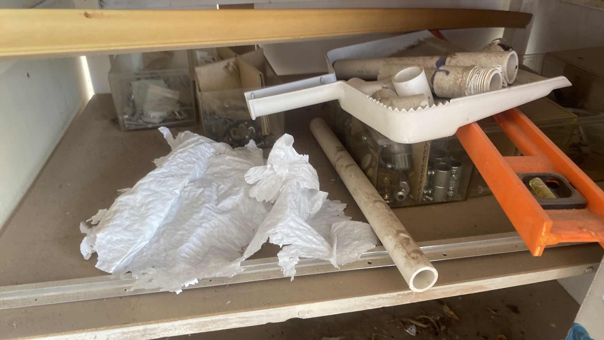 Photo 1 of CONTENTS OF CABINET BACKYARD, YARD BLOWER, LEVELER, NUTS AND BOLTS EXTENSION CORDS AND MORE