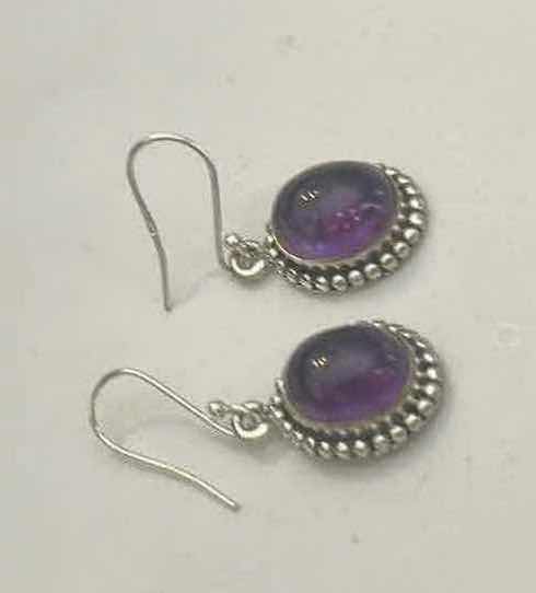 Photo 1 of STERLING SILVER EARRINGS WITH PURPLE GEMSTONES