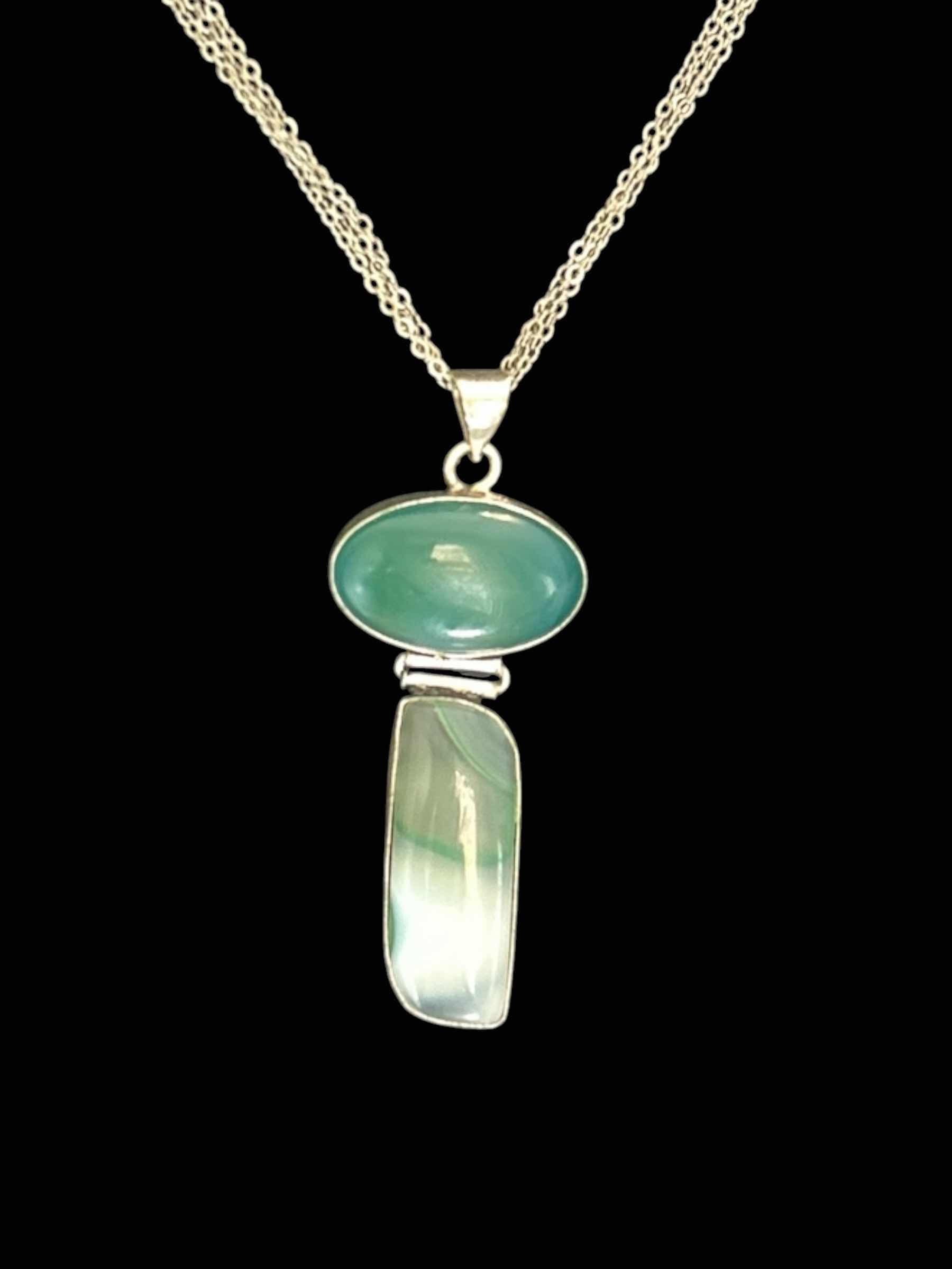 Photo 1 of STERLING SILVER WITH STONES PENDANT AND SILVER TONE CHAIN