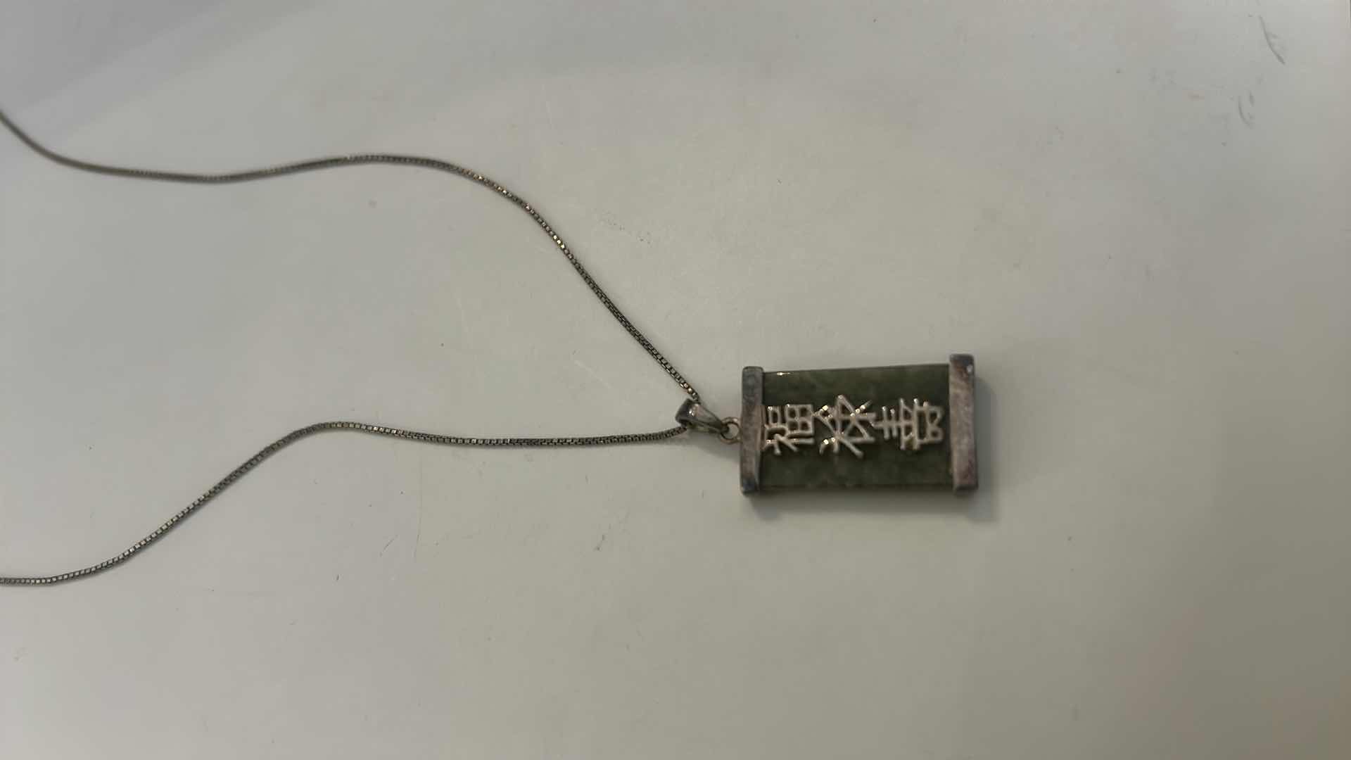Photo 1 of VINTAGE STERLING SILVER GREEN JADE CHINESE PENDANT ON CHAIN