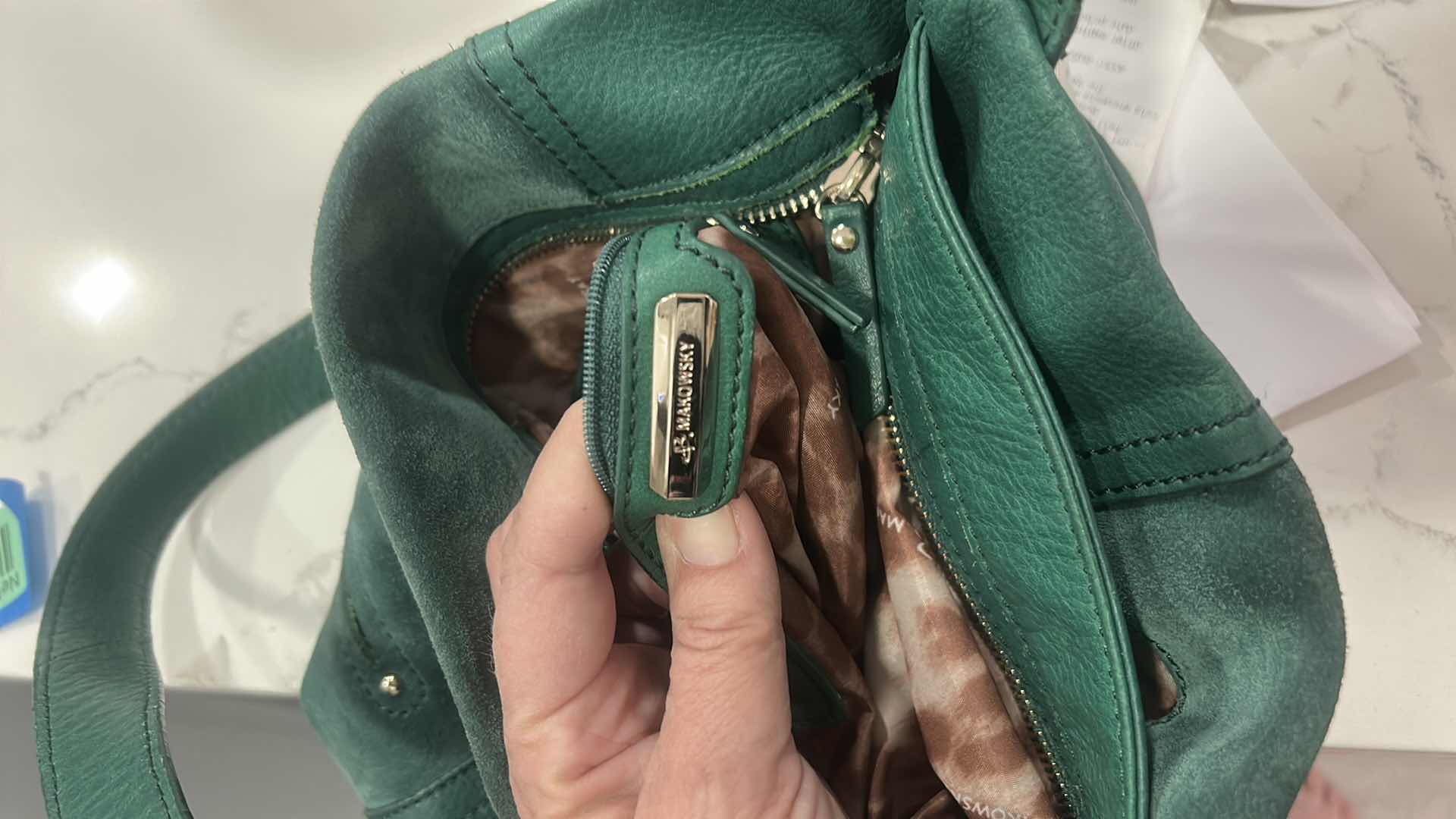 Photo 1 of VINTAGE GREEN LEATHER AND SUEDE HANDBAG