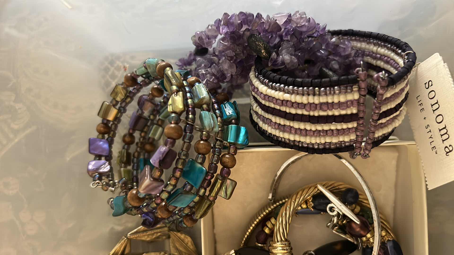 Photo 1 of CONTENTS OF CONTAINER ASSORTED WOMENS COSTUME JEWELRY