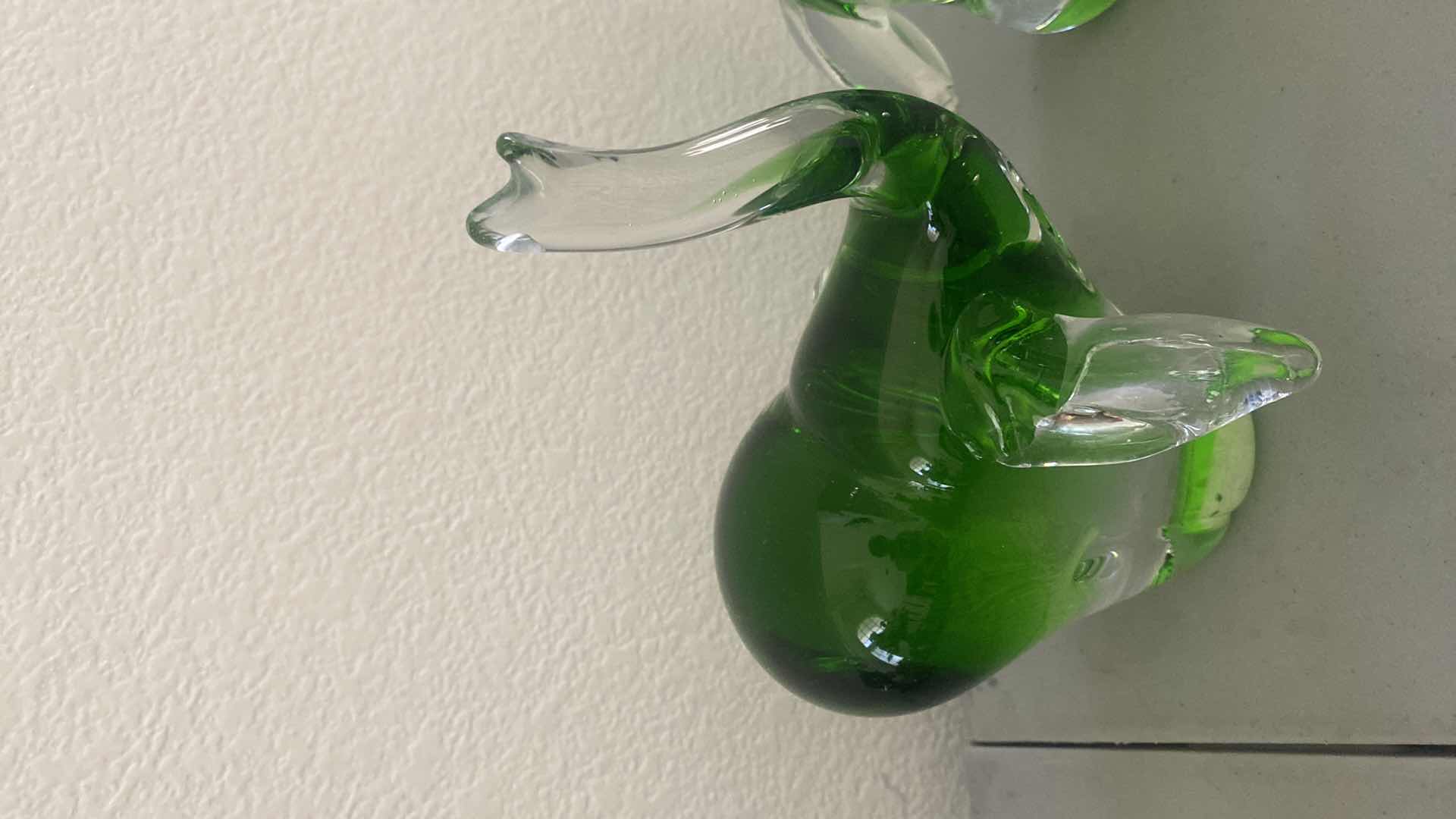 Photo 1 of PAIR OF GREEN GLASS HAND BLOWN ELEPHANTS H8 1/2”