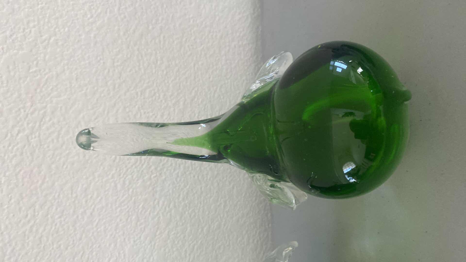 Photo 1 of PAIR OF GREEN GLASS HAND BLOWN ELEPHANTS H8 1/2”