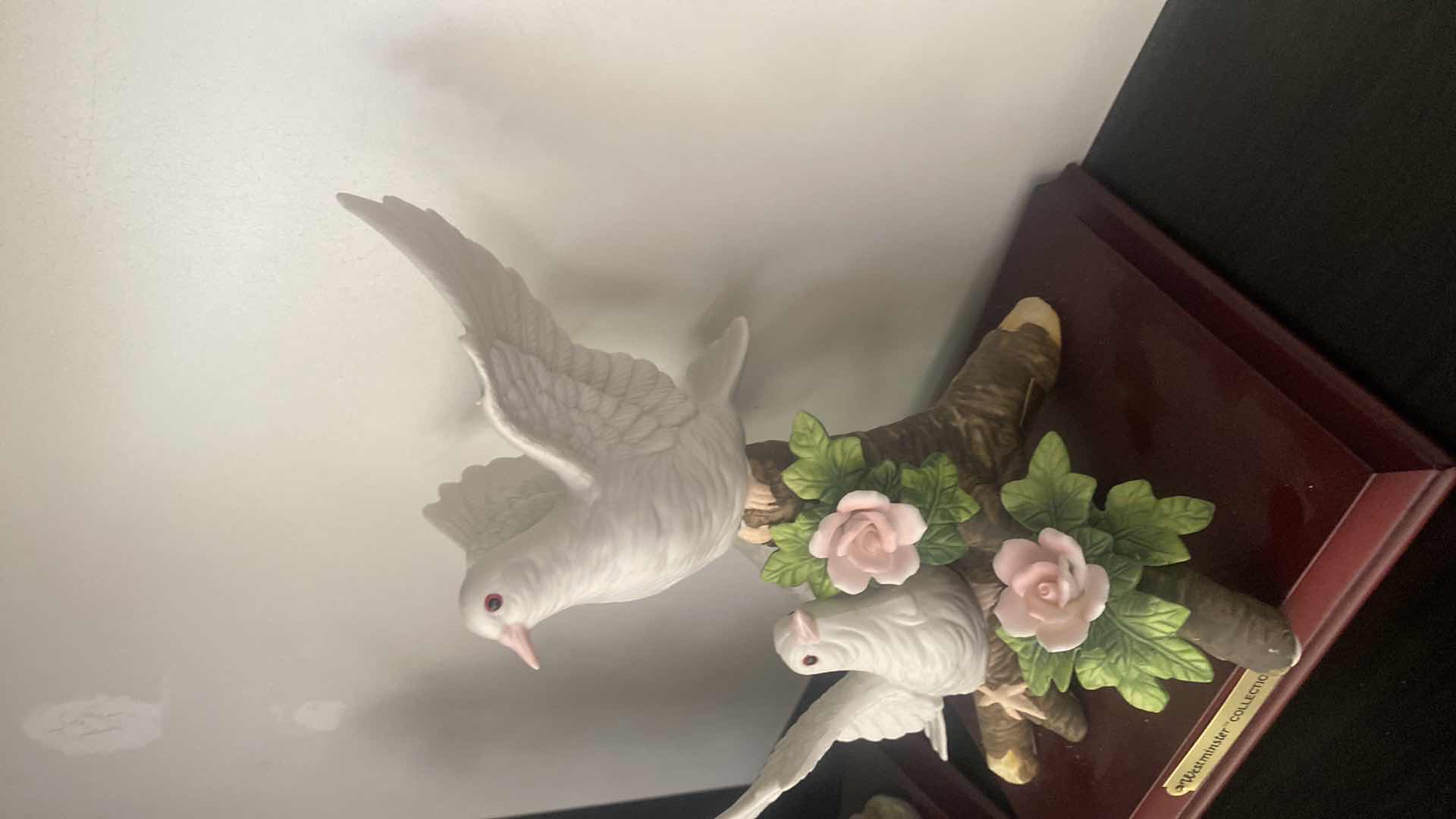 Photo 1 of PAIR OF WESTMINSTER COLLECTION  CERAMIC BIRDS WITH STANDS 8” x 9”