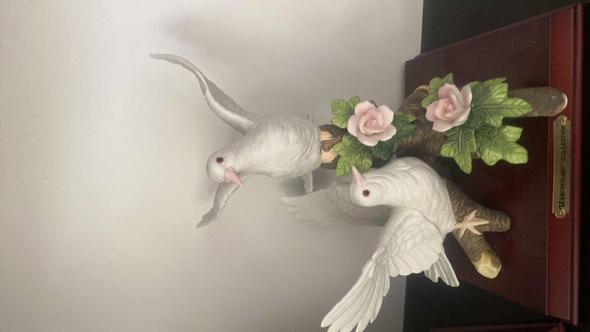 Photo 1 of PAIR OF WESTMINSTER COLLECTION  CERAMIC BIRDS WITH STANDS 8” x 9”