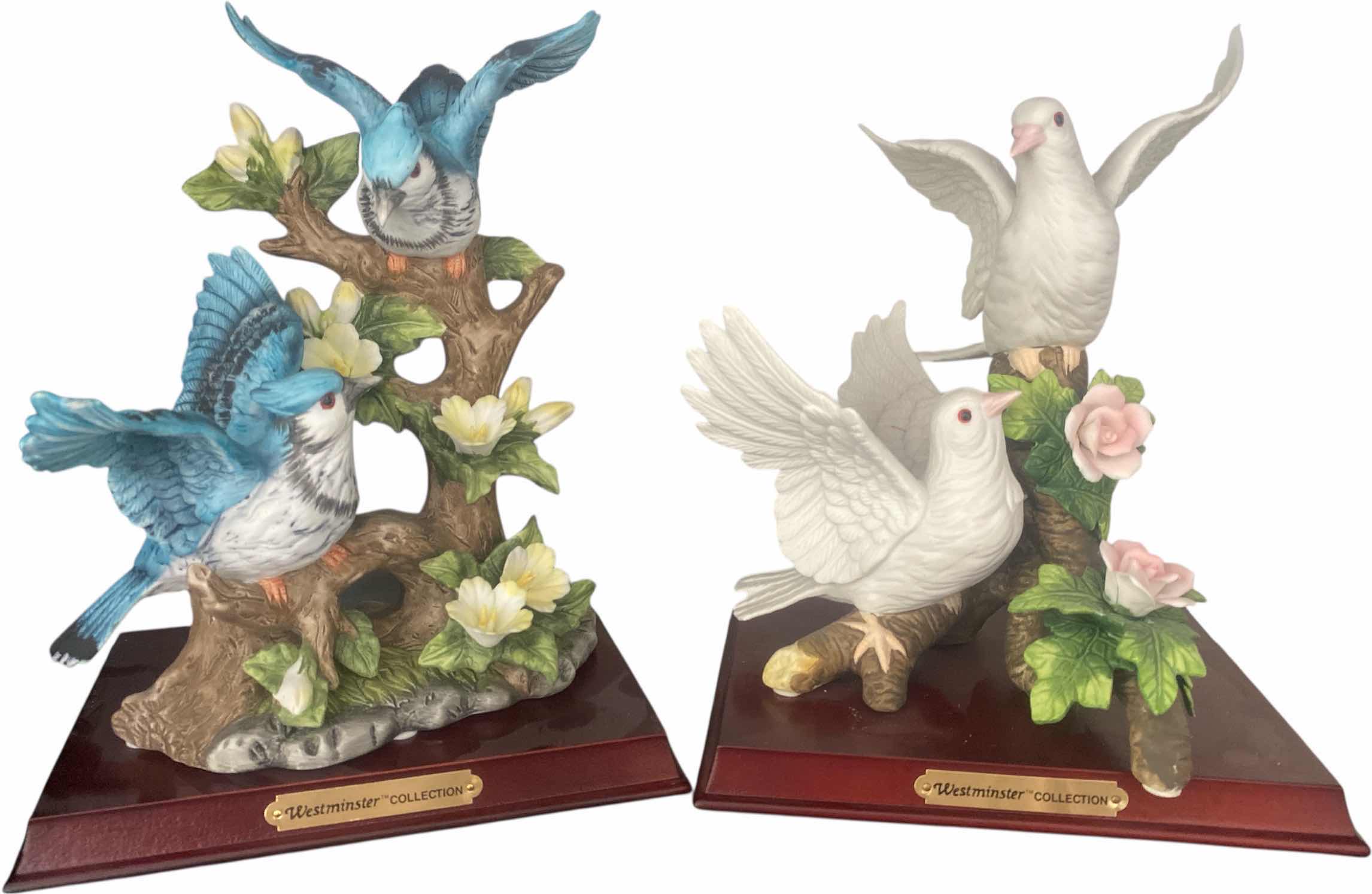 Photo 1 of PAIR OF WESTMINSTER COLLECTION  CERAMIC BIRDS WITH STANDS 8” x 9”