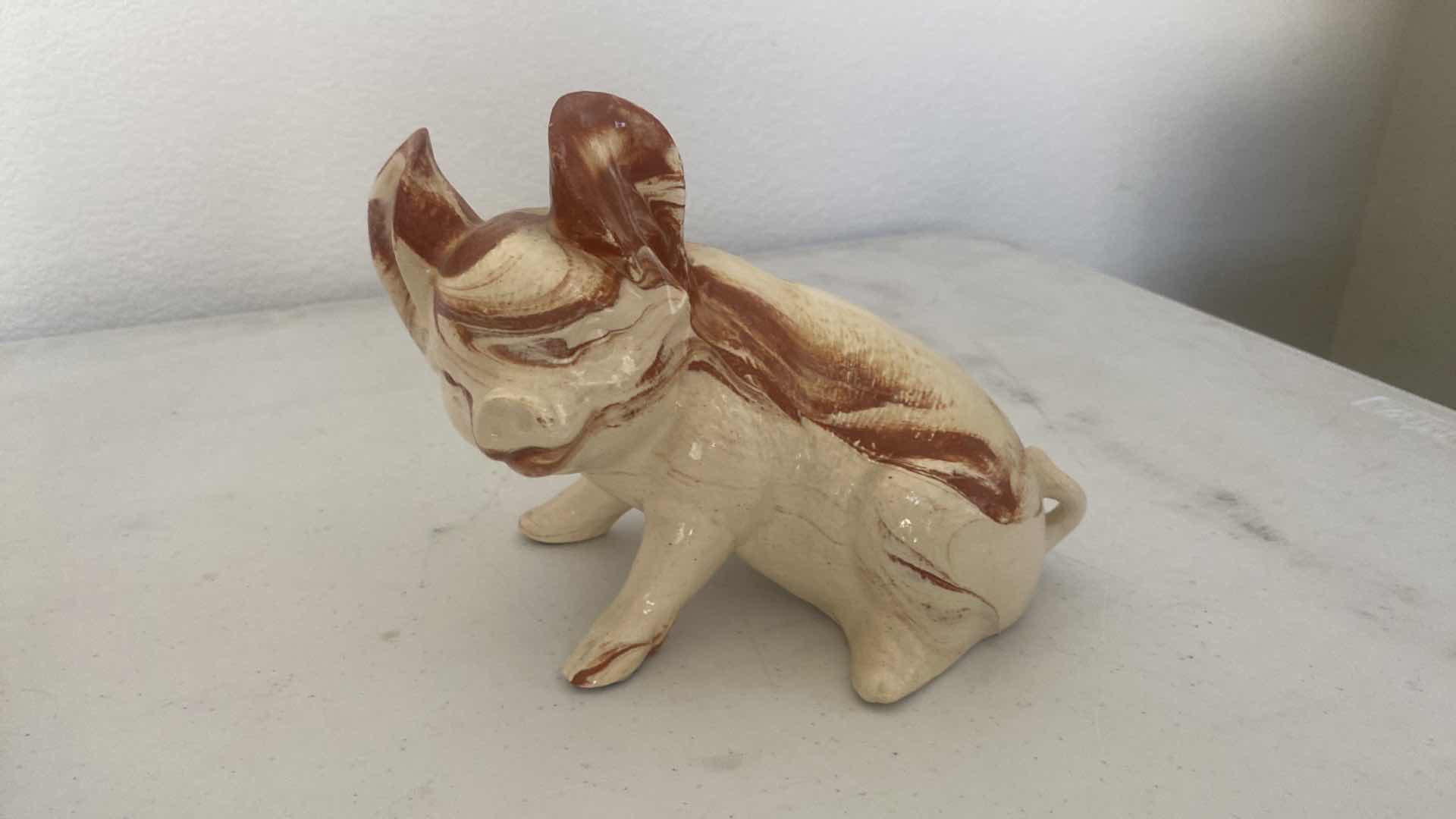 Photo 1 of PAIR OF CERAMIC PIGS LARGEST 9 1/2” x 5 1/2”