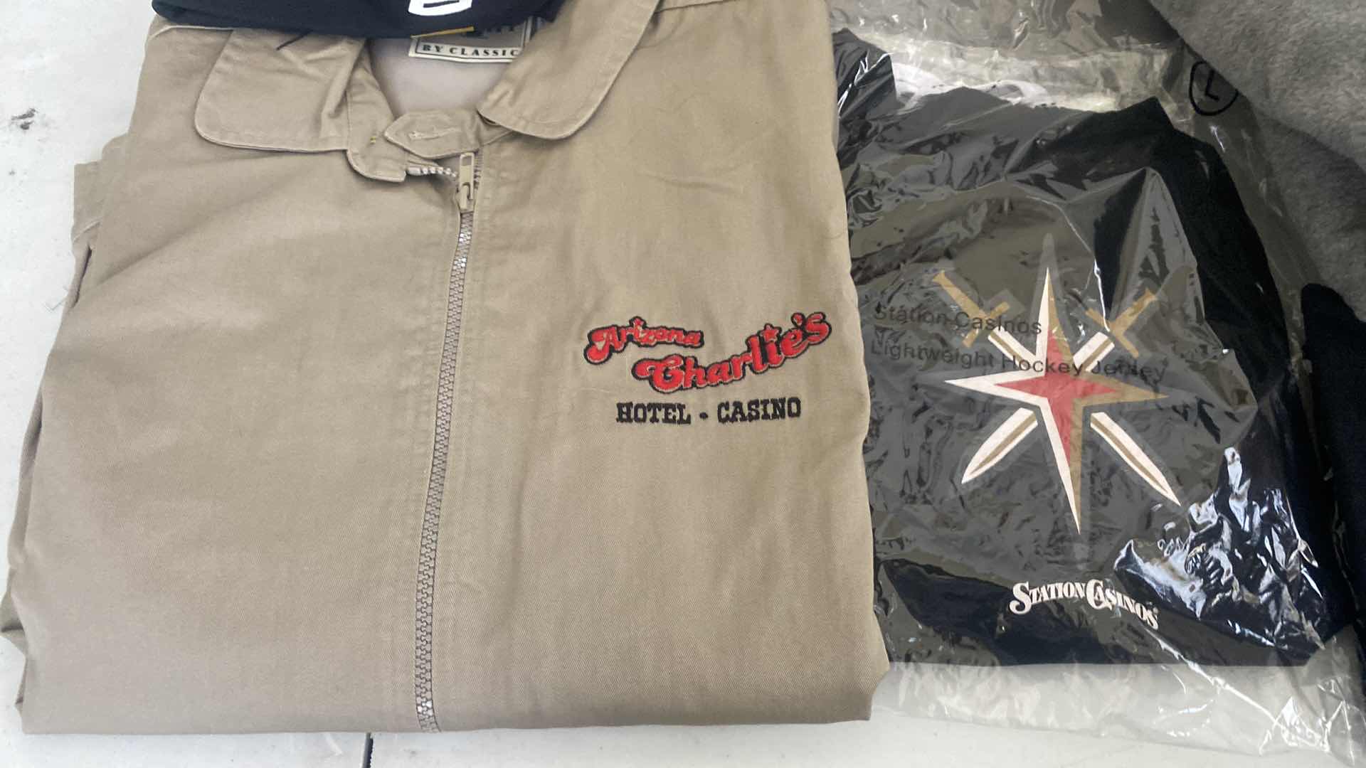 Photo 1 of 9 - MENS CASINO GIVE AWAY SHIRTS & JACKETS SIZES LARGE & X-LARGE