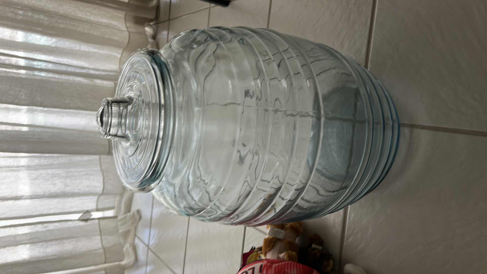 Photo 1 of LARGE GLASS JAR WITH LID H19”