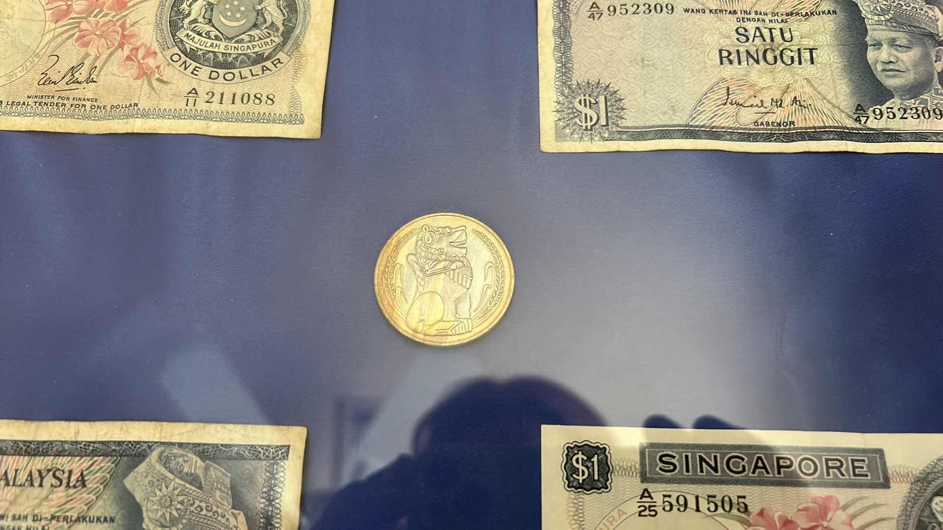 Photo 1 of FRAMED MONEY COLLECTION - PAPER BILLS AND COIN 16” x H20”
