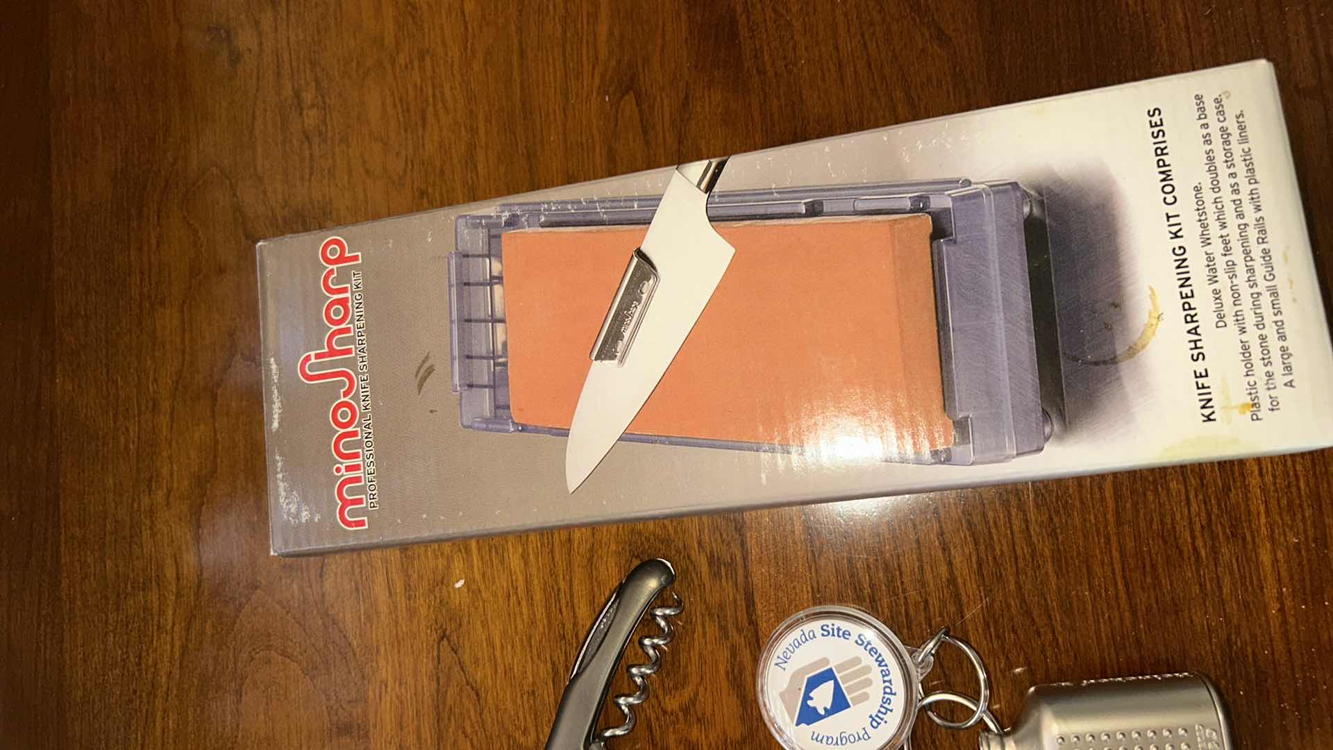 Photo 1 of KITCHEN ITEMS - WINE OPENERS, KNIFE SHARPENING KIT, MINI SLOW COOKER AND CUTTING BOARD