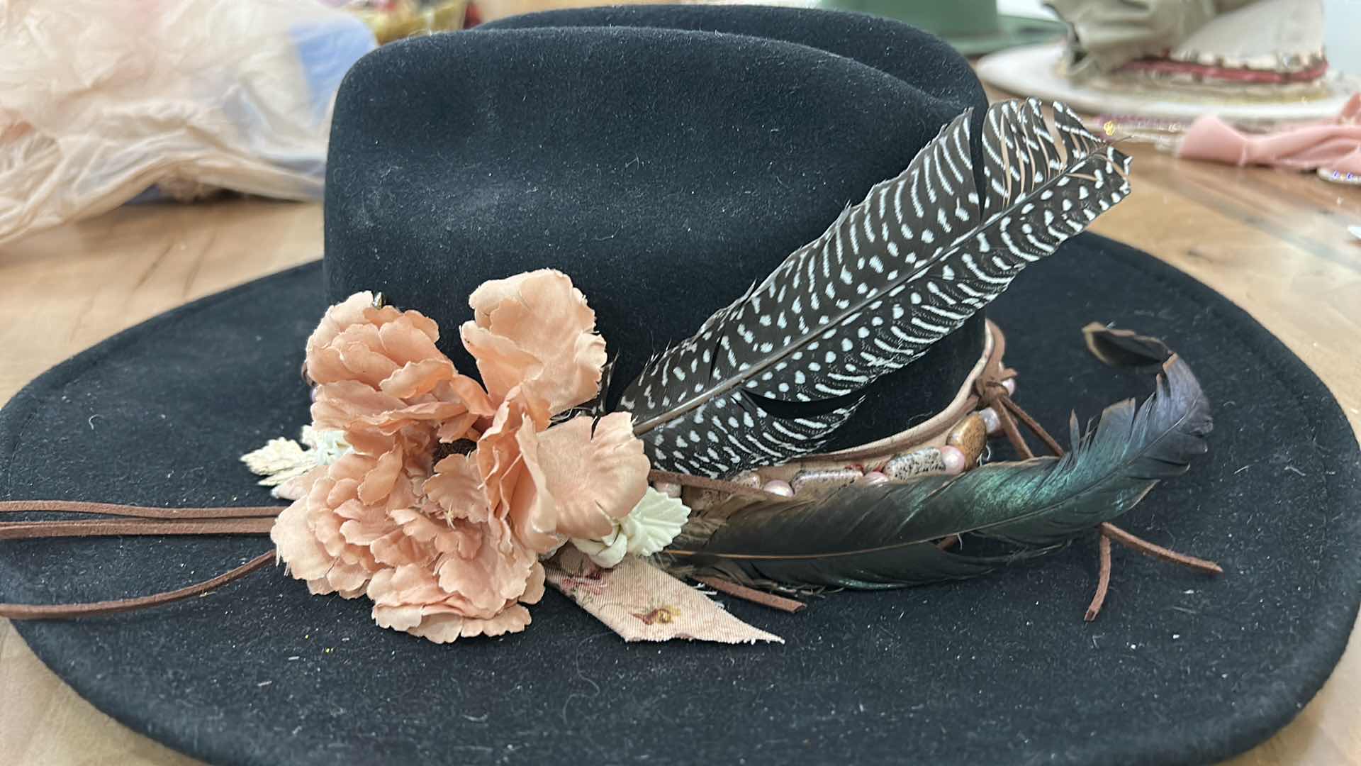 Photo 1 of NEW- CUSTOM 100% WOOL BLACK COWBOY HAT WOMENS LARGE ( ALL ACCESSORIES ARE REMOVABLE AND INTERCHANGEABLE)