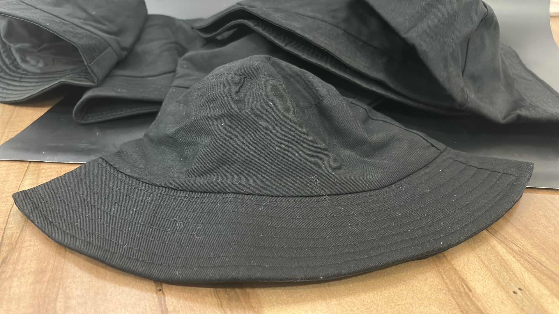 Photo 1 of NEW- 6 WOMENS BLACK BUCKET HATS