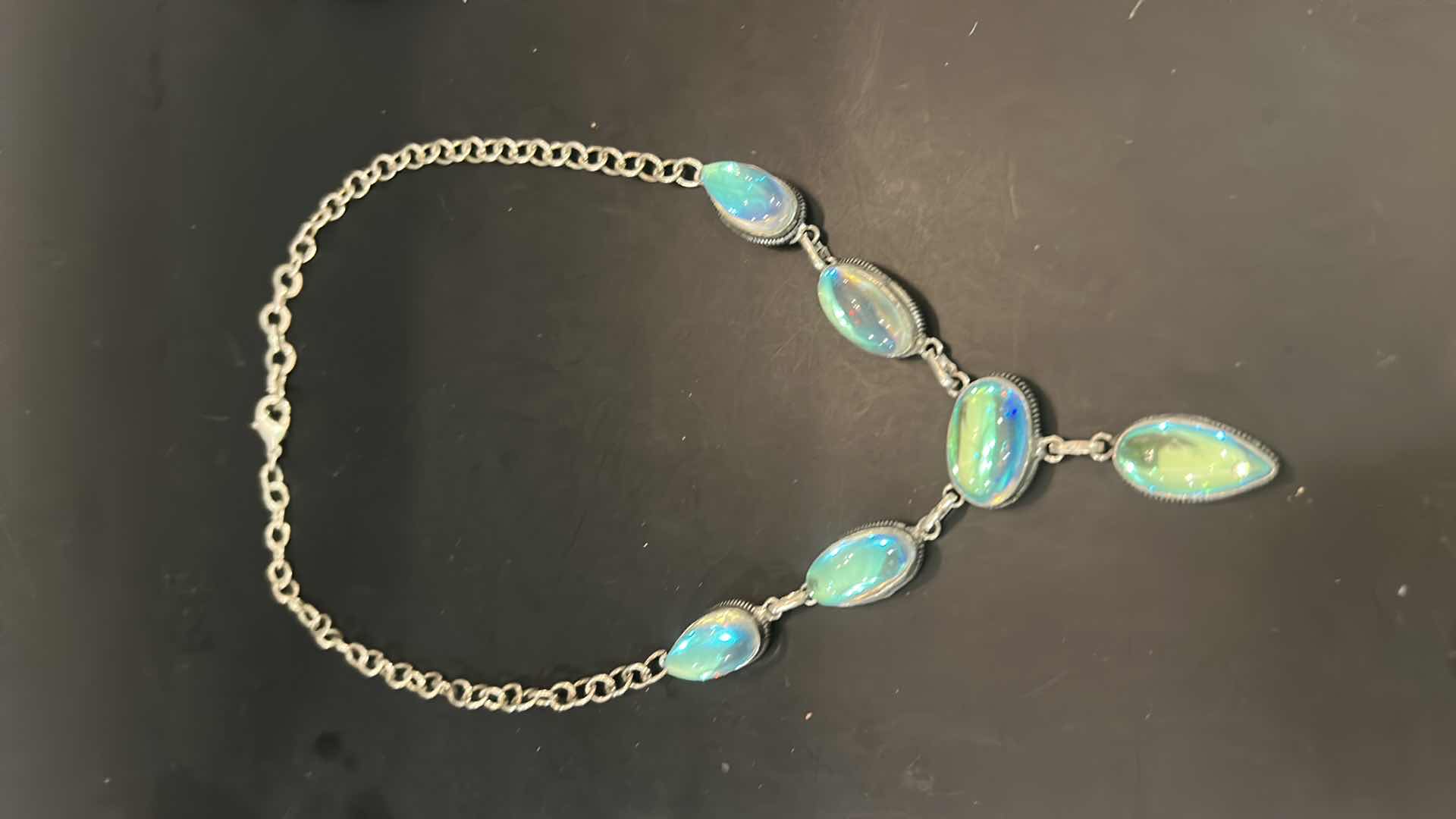 Photo 1 of STERLING SILVER NECKLACE WITH IRIDESCENT STONES