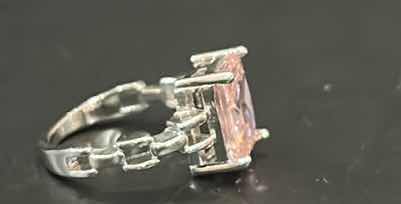 Photo 1 of STERLING SILVER RING WITH PINK GEMSTONE ESTIMATED SIZE 6