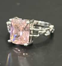 Photo 1 of STERLING SILVER RING WITH PINK GEMSTONE ESTIMATED SIZE 6